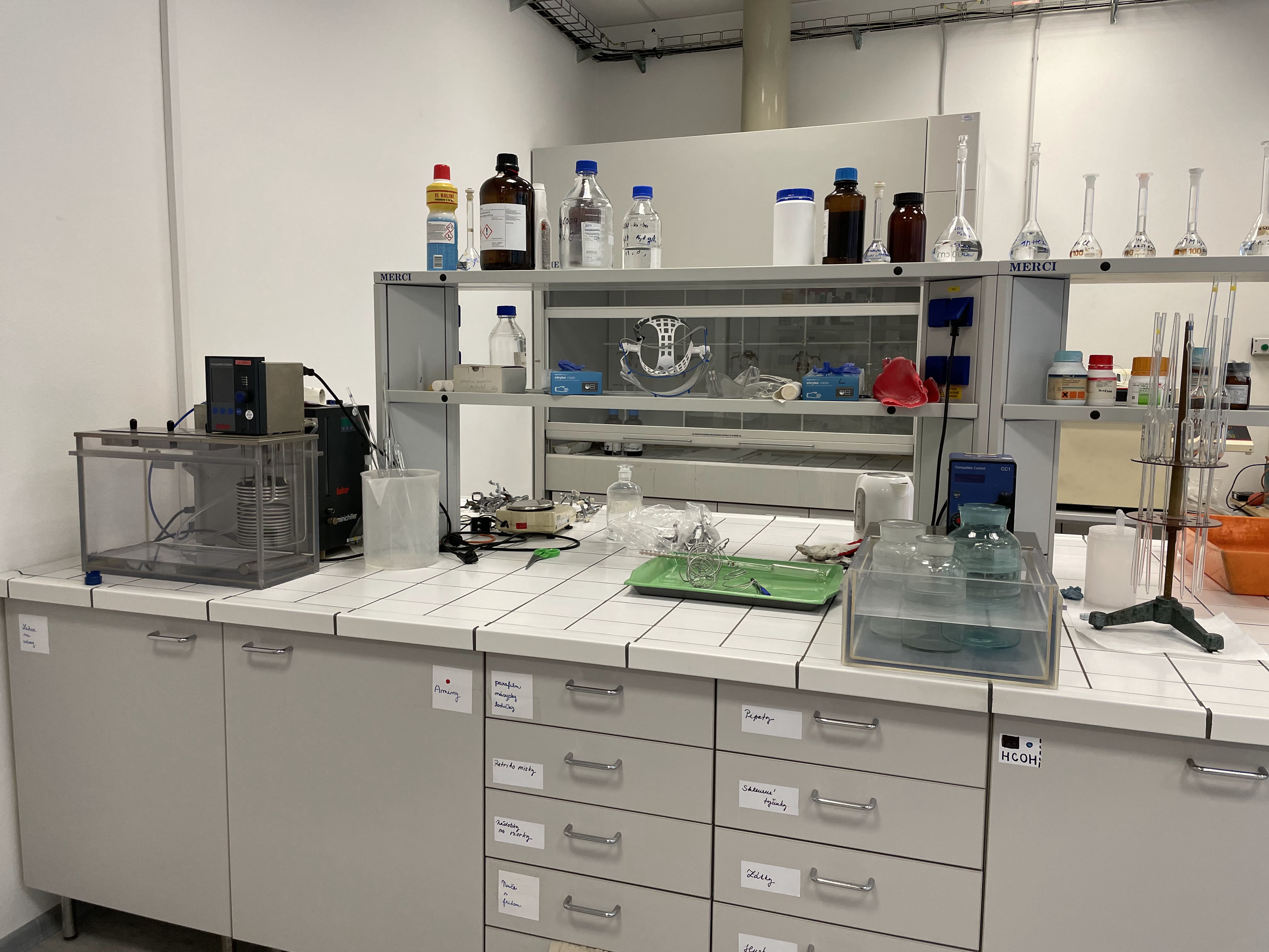 Textile testing laboratory workspace with instruments